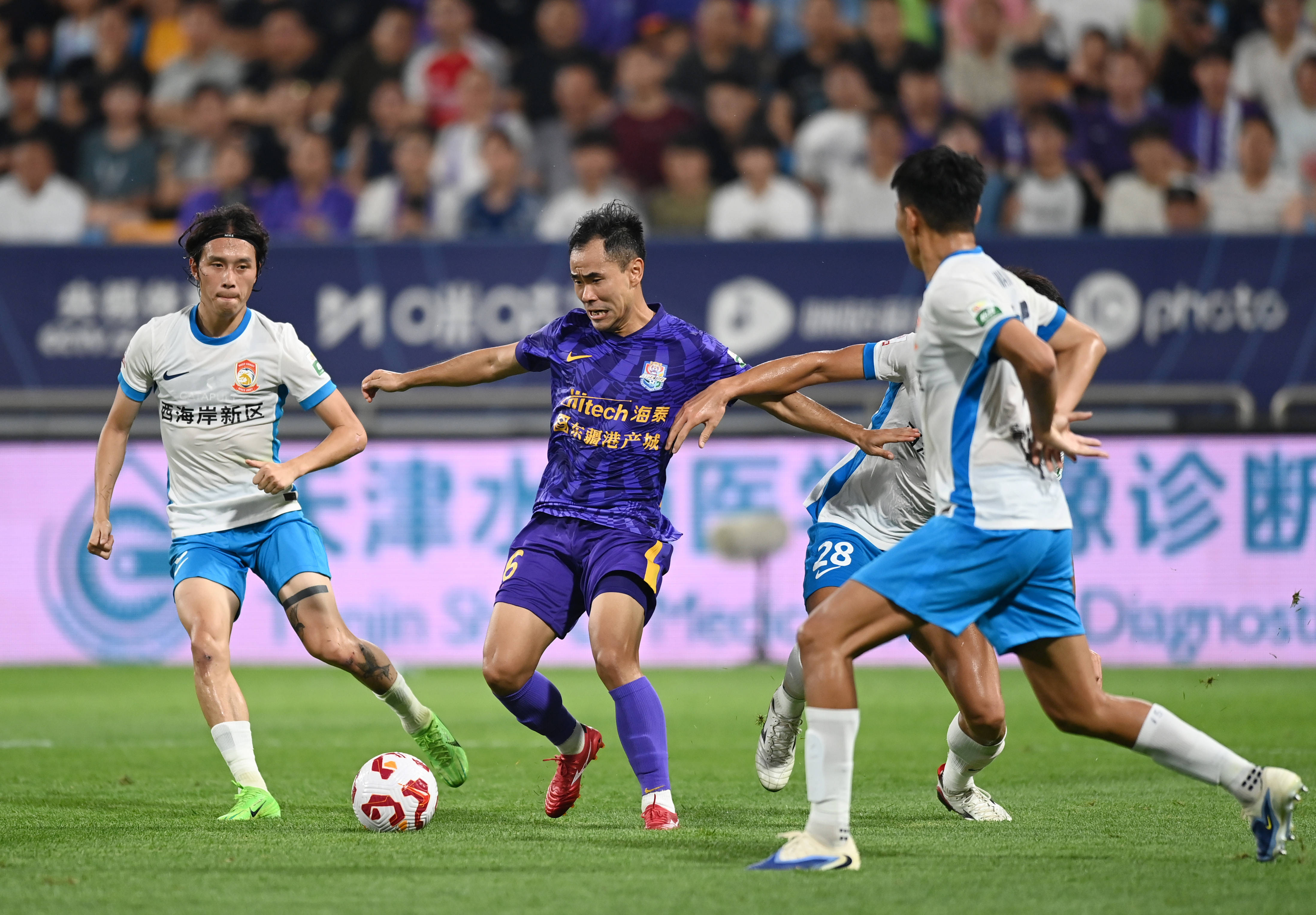 （体育）足球——中超：天津津门虎平青岛西海岸